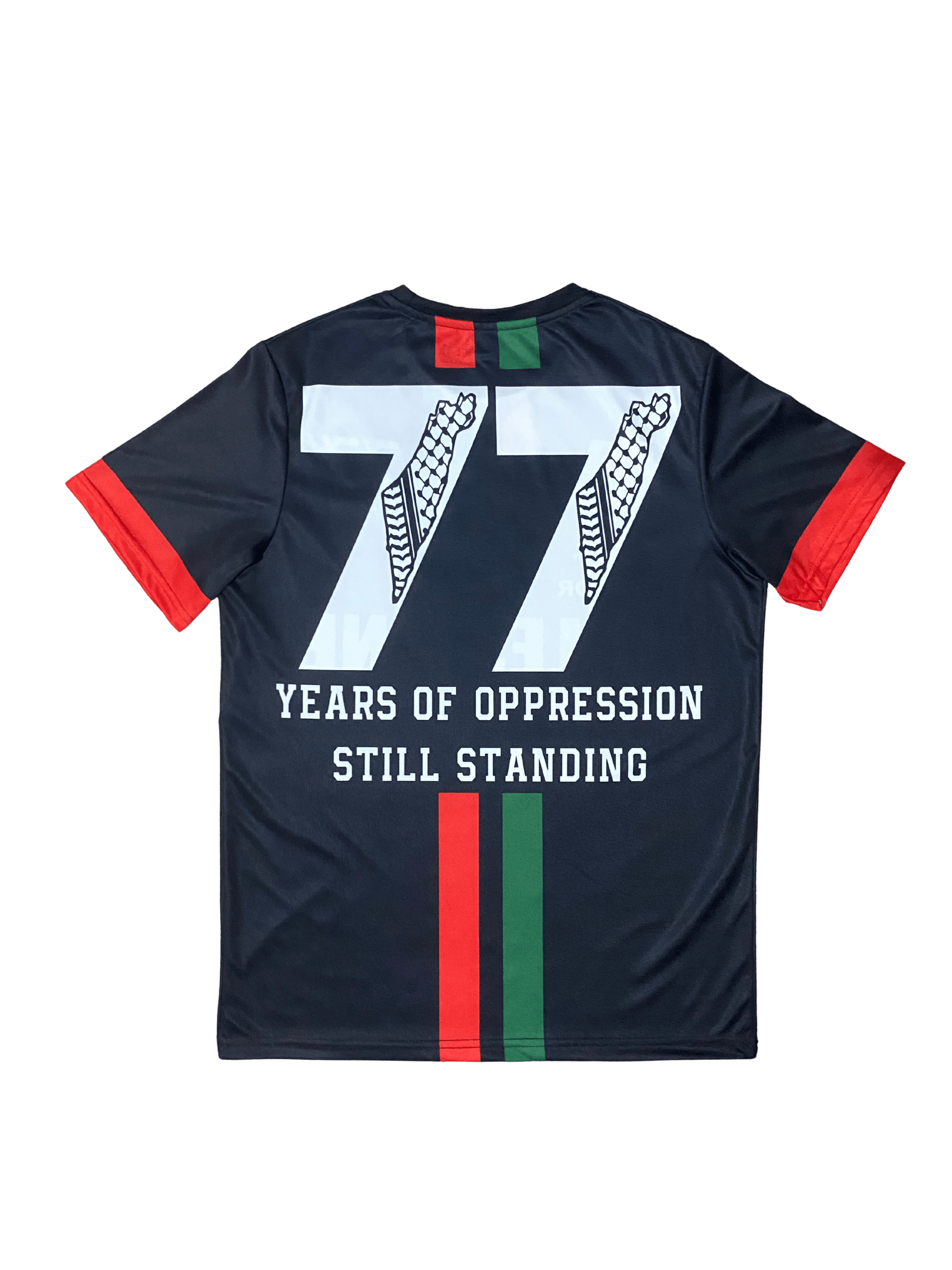 Black Palestine football jersey back with red and green stripes, large 77 in keffiyeh pattern, and “77 years of oppression still standing” text underneath